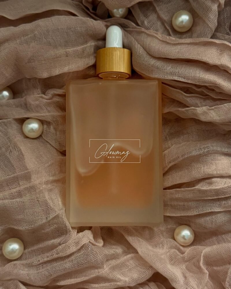 ⁦The signature hair oil⁩ - الصورة ⁦4⁩